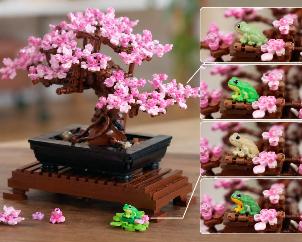 Close-up macro photograph of the LEGO Bonsai Tree showing interchangeable pink cherry blossom frogs