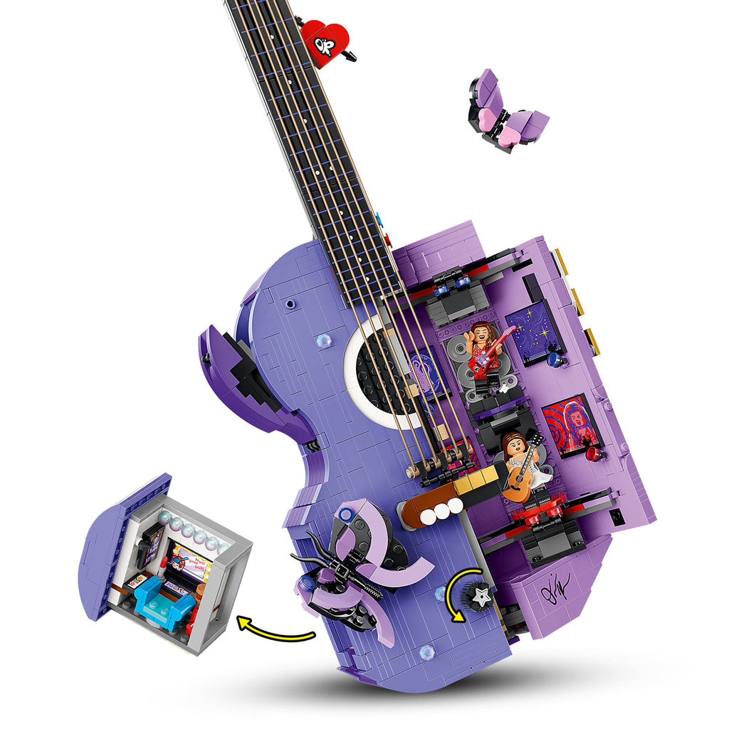 Close-up of the hidden backstage dressing room compartment inside the LEGO Olivia Rodrigo Dual Guitar set showing the miniature burger detail.